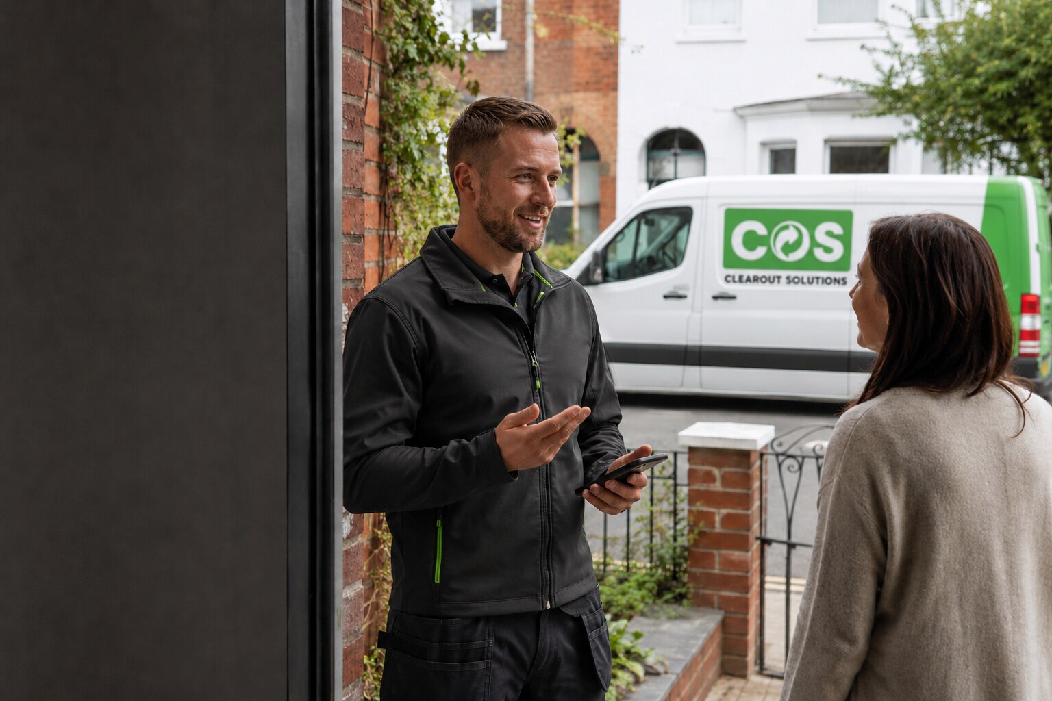 Clearance specialist discussing a collection enquiry with a customer.